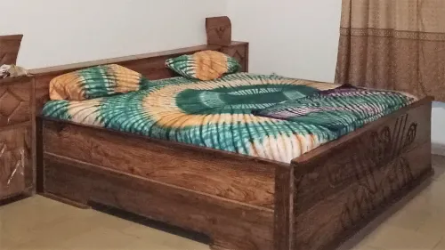 Chambre d'accueil avec lit